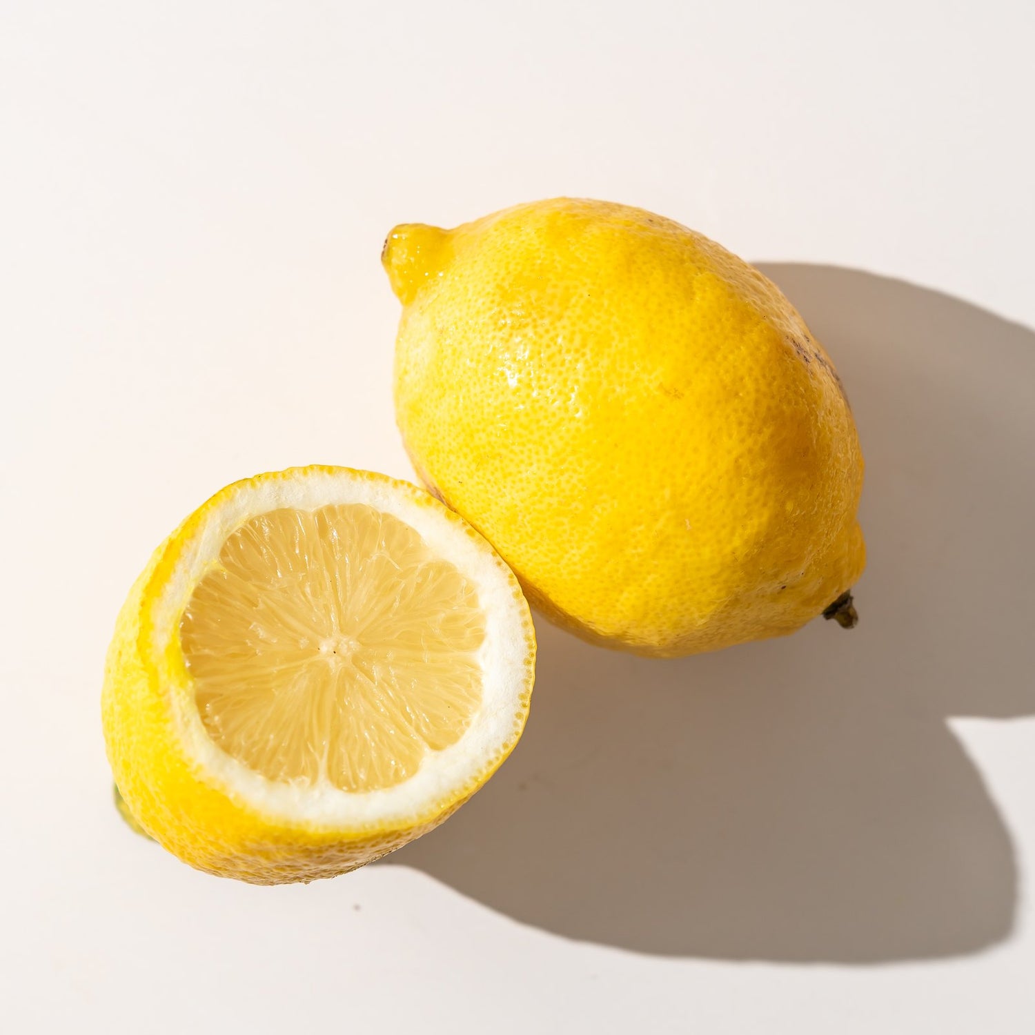 Fresh lemon with juicy cross-section