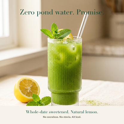 A fresh glass of Releaf greens with lemon and mint. Zero pond water, whole-date sweetened, no sucralose or stevia