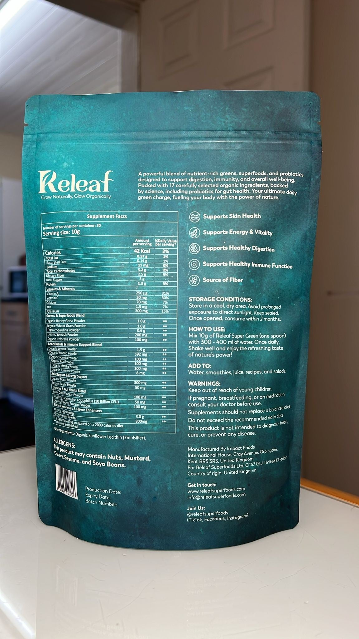 Back of Releaf Super Greens pouch showing full supplement facts and ingredient amounts